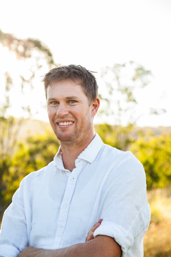 Man standing on a rural property near Carrowbrook, New South Wales