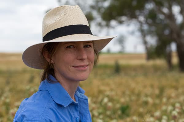 Farmer standing in a paddock in the Hilltops region of New South Wales